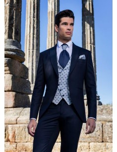 Traje de novio azul con chaleco florentino